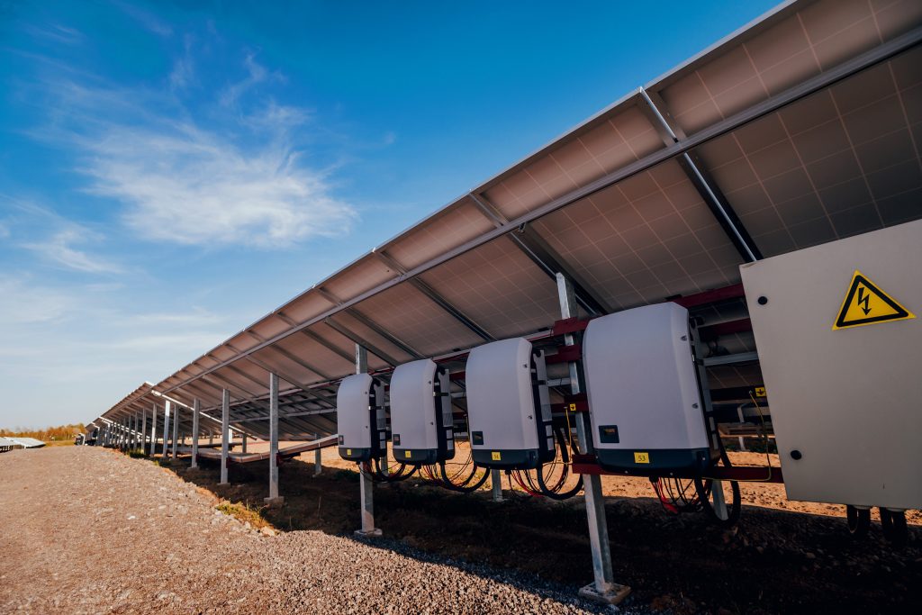 Back view of solar panel. Inverters to transform direct current into alternate.